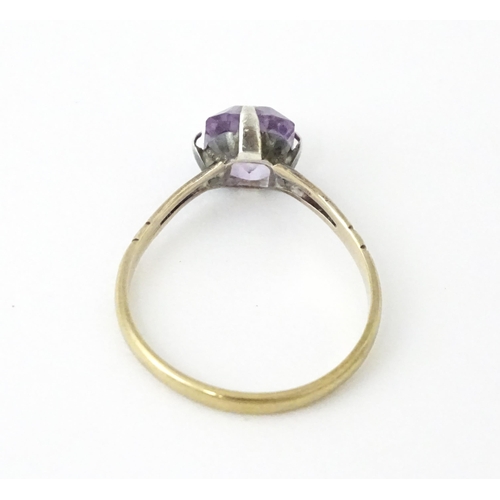 730 - A 9ct gold brooch set with amethyst with seed pearls. Together with a ring set  with amethyst and ma... 