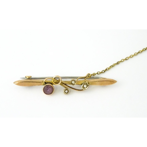 730 - A 9ct gold brooch set with amethyst with seed pearls. Together with a ring set  with amethyst and ma... 