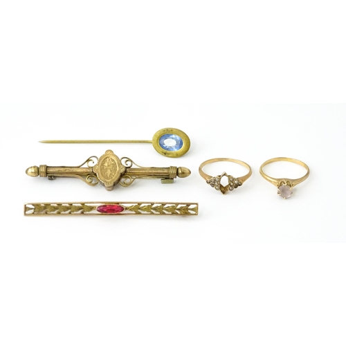 731 - A 10k bar brooch together with various gilt metal and yellow metal brooches and rings