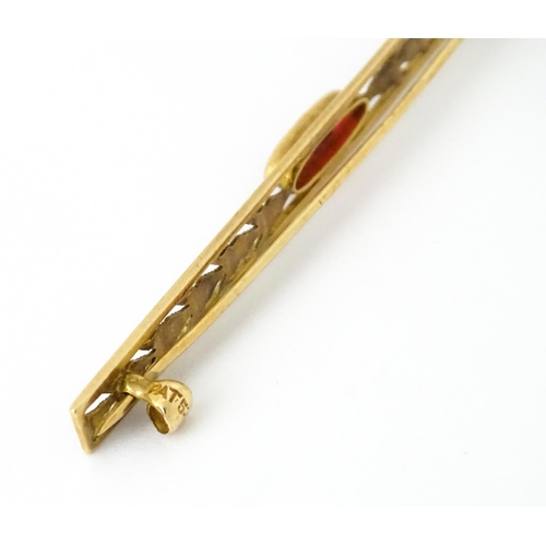 731 - A 10k bar brooch together with various gilt metal and yellow metal brooches and rings