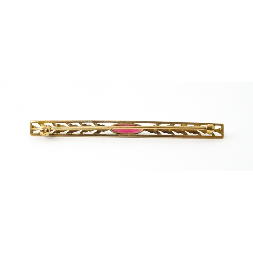 731 - A 10k bar brooch together with various gilt metal and yellow metal brooches and rings