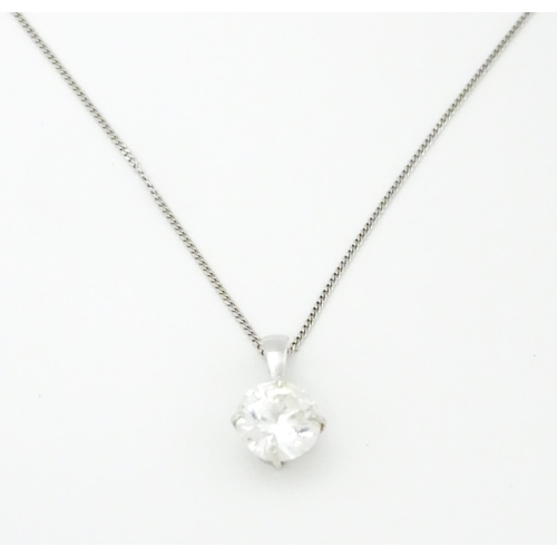 747 - A 9ct white gold necklace with pendant set with white stone/ the chain approx 14