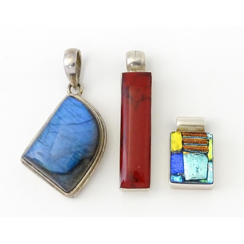 752 - Three 20thC Modernist silver pendants, one set with labradorite, another with red hardstone detail, ... 