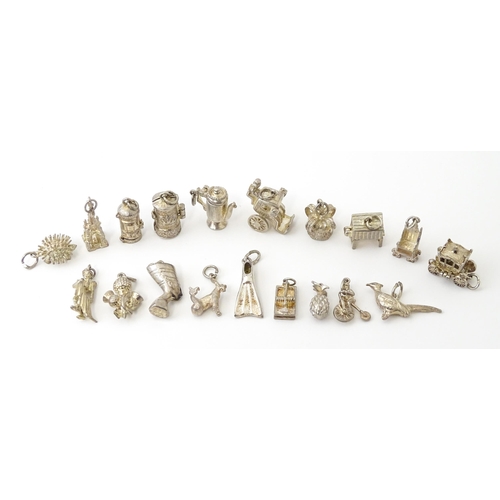 759 - A quantity of assorted white metal charms to include pheasant, flipper, mousetrap, pineapple, hedgeh... 