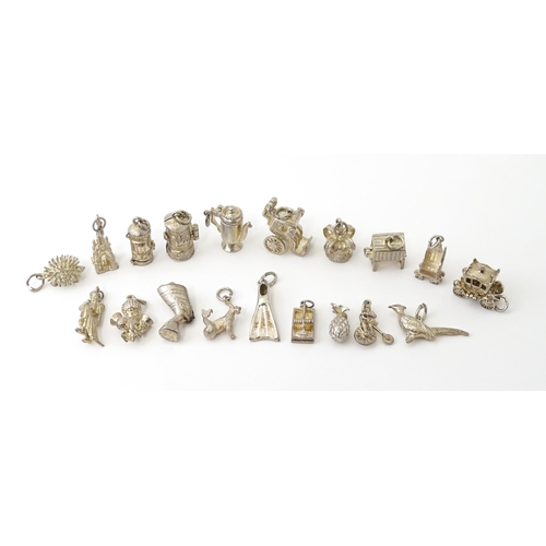 759 - A quantity of assorted white metal charms to include pheasant, flipper, mousetrap, pineapple, hedgeh... 