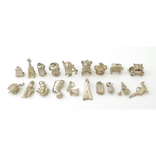 759 - A quantity of assorted white metal charms to include pheasant, flipper, mousetrap, pineapple, hedgeh... 