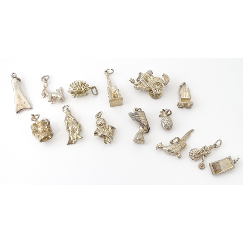 759 - A quantity of assorted white metal charms to include pheasant, flipper, mousetrap, pineapple, hedgeh... 