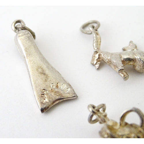 759 - A quantity of assorted white metal charms to include pheasant, flipper, mousetrap, pineapple, hedgeh... 