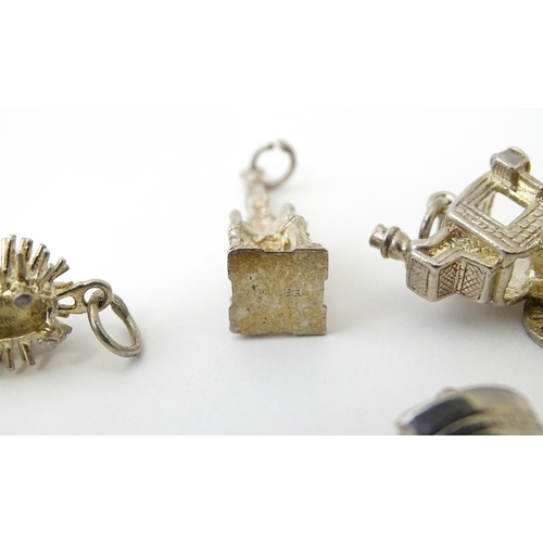 759 - A quantity of assorted white metal charms to include pheasant, flipper, mousetrap, pineapple, hedgeh... 