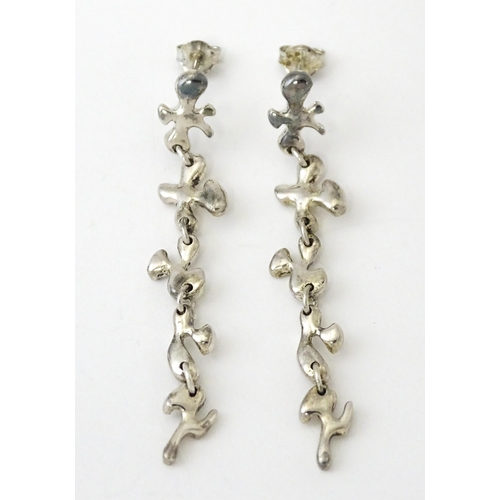 760 - A pair of silver drop earrings. Approx. 2