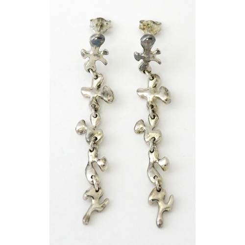 760 - A pair of silver drop earrings. Approx. 2