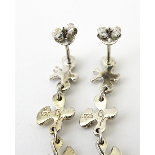 760 - A pair of silver drop earrings. Approx. 2