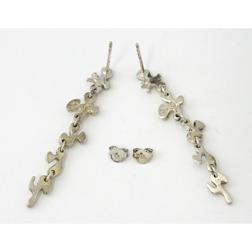 760 - A pair of silver drop earrings. Approx. 2