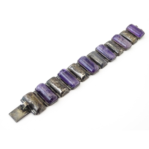 766 - Mexican silver items to include a bracelet set with amethyst by Damaso Gallegos of Taxco, a silver b... 