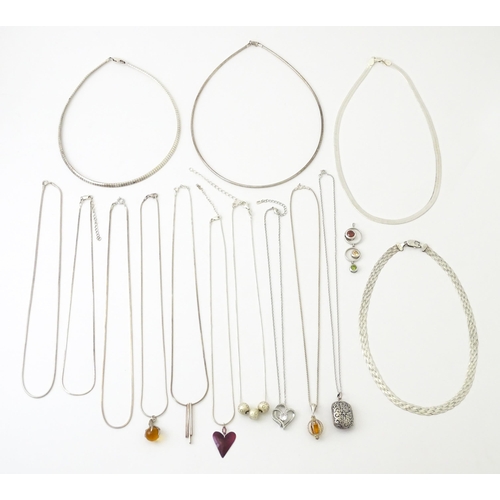 772 - A large quantity of silver and white metal necklaces, pendants etc.