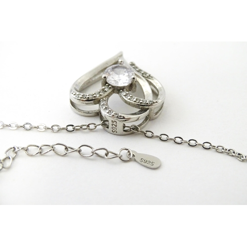 772 - A large quantity of silver and white metal necklaces, pendants etc.