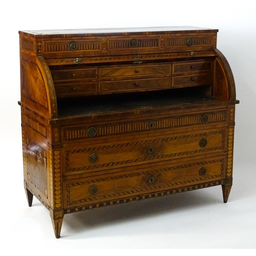 1454 - A 19thC continental desk with a roll top front having satinwood marquetry decoration alongside decor... 