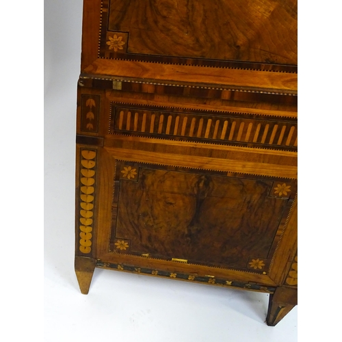 1454 - A 19thC continental desk with a roll top front having satinwood marquetry decoration alongside decor... 