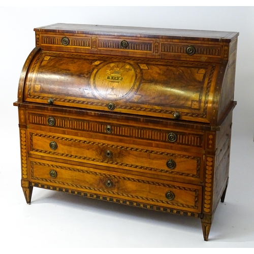 1454 - A 19thC continental desk with a roll top front having satinwood marquetry decoration alongside decor... 