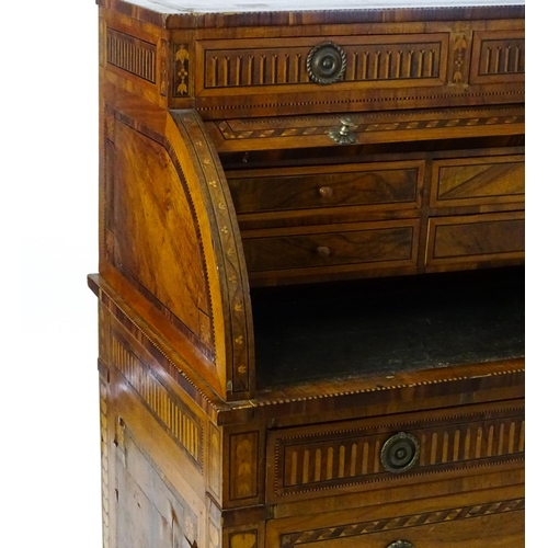 1454 - A 19thC continental desk with a roll top front having satinwood marquetry decoration alongside decor... 