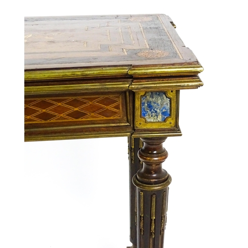 1513 - A 19thC card table with a marquetry inlaid cornucopia to the top and brass mouldings to the rim. The... 