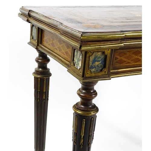 1513 - A 19thC card table with a marquetry inlaid cornucopia to the top and brass mouldings to the rim. The... 