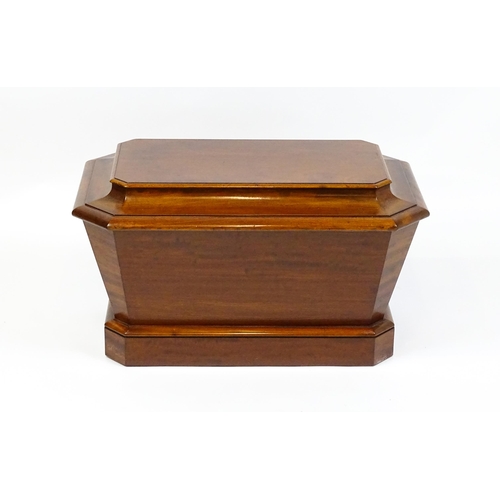 1533 - An early 19thC mahogany wine cooler of sarcophagus form with a moulded hinged lid above a panelled f... 