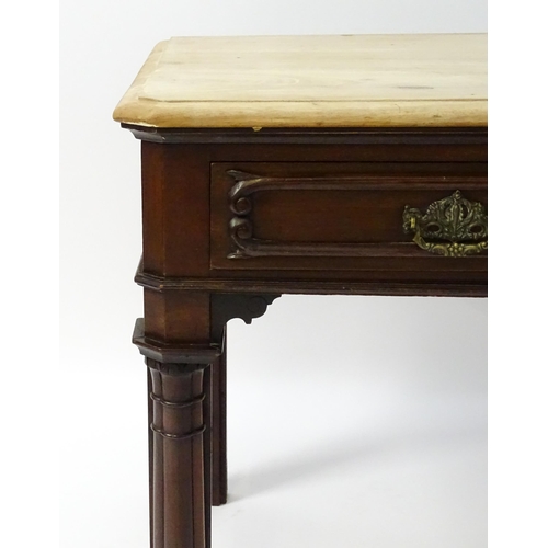 1546 - A late 19thC mahogany table with a single frieze drawer with carved mouldings above cluster column f... 