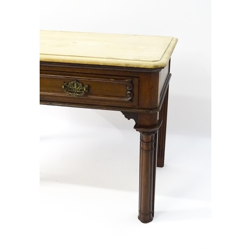 1546 - A late 19thC mahogany table with a single frieze drawer with carved mouldings above cluster column f... 