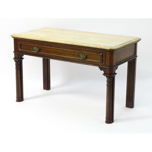 1546 - A late 19thC mahogany table with a single frieze drawer with carved mouldings above cluster column f... 