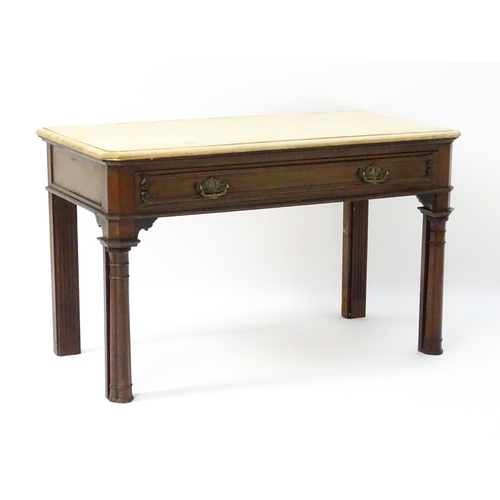 1546 - A late 19thC mahogany table with a single frieze drawer with carved mouldings above cluster column f... 