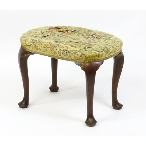 1589 - A Queen Anne stool raised on four cabriole legs terminating in pad feet. 23