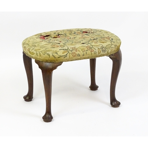 1589 - A Queen Anne stool raised on four cabriole legs terminating in pad feet. 23