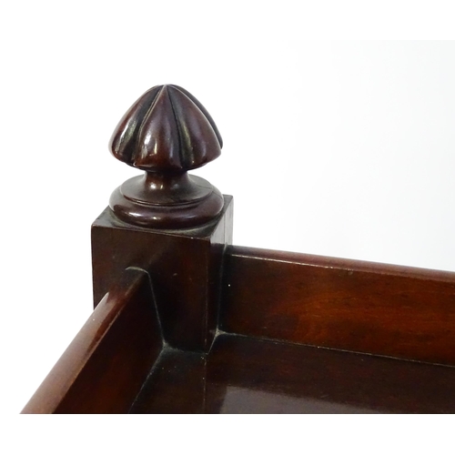 1591 - A Victorian mahogany buffet with gadrooned finials matched to the carved tapering legs. The buffet h... 