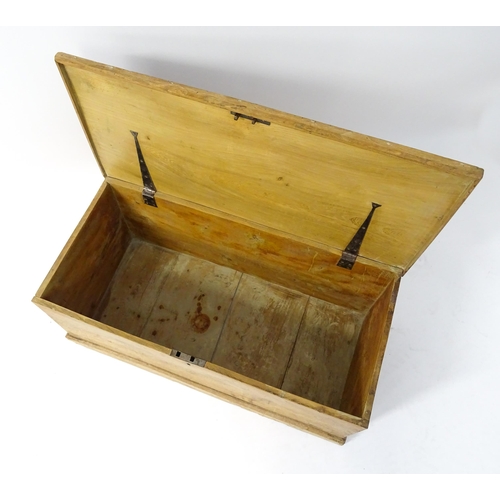 1614 - A 19thC elm blanket box with wrought iron hinges and a stepped base. 37