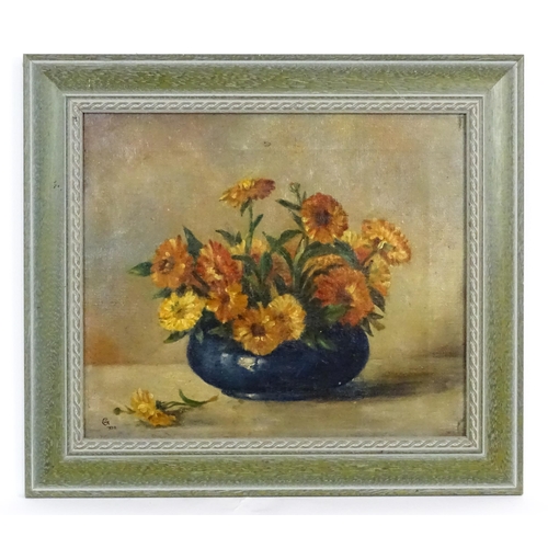 1725 - Early 20th century, Oil on canvas, A still life study depicting marigolds in a vase. Signed with mon... 