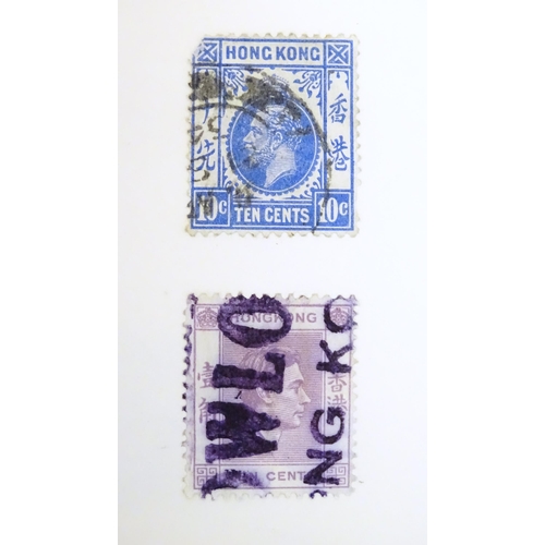 1972 - A quantity of late 19thC and later worldwide postage stamps within albums, together with a loose exa... 