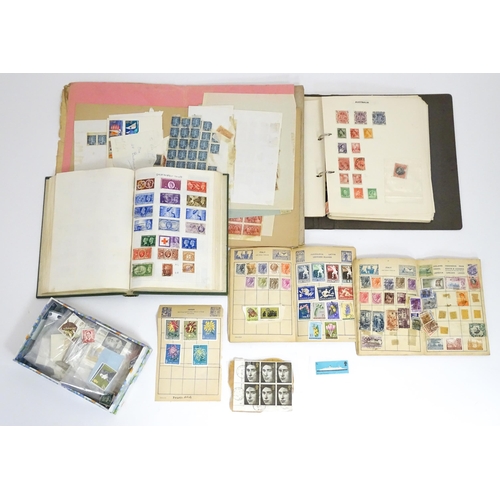 1972 - A quantity of late 19thC and later worldwide postage stamps within albums, together with a loose exa... 