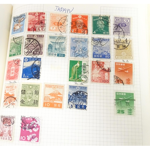 1972 - A quantity of late 19thC and later worldwide postage stamps within albums, together with a loose exa... 