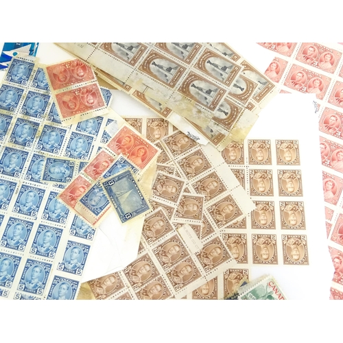 1972 - A quantity of late 19thC and later worldwide postage stamps within albums, together with a loose exa... 