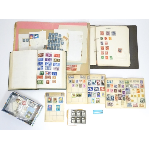 1972 - A quantity of late 19thC and later worldwide postage stamps within albums, together with a loose exa... 