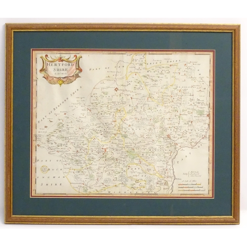 1976 - Map: An engraved map of Hertfordshire by Robert Morden, with hand colouring. Approx. 14 1/4