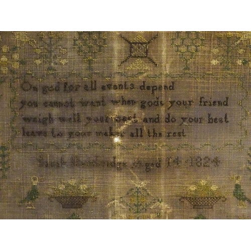 1983 - An early 19thC needlework sampler embroidered with figures, trees, birds, etc, with verse to centre,... 