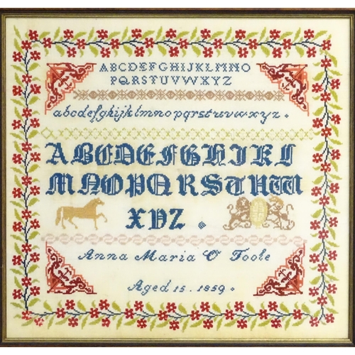 1984 - A needlework sampler embroidered with the letters of the alphabet, a horse and coat of arms, with a ... 