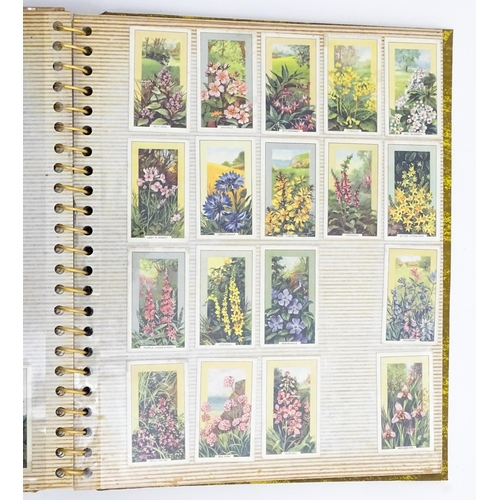 1966 - Collectors cigarette cards: A quantity of assorted cigarette cards to include examples by Wills's Ci... 