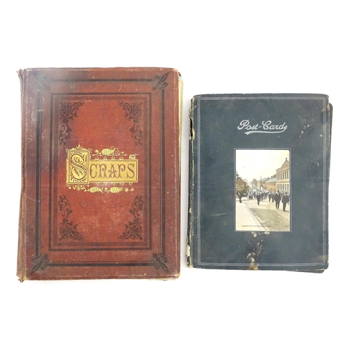 1970 - A Victorian scrapbook to include Christmas cards, greetings cards, scraps depicting cats, dogs, chil... 