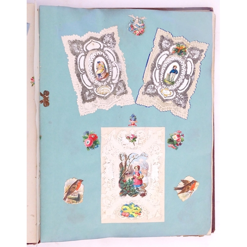 1970 - A Victorian scrapbook to include Christmas cards, greetings cards, scraps depicting cats, dogs, chil... 