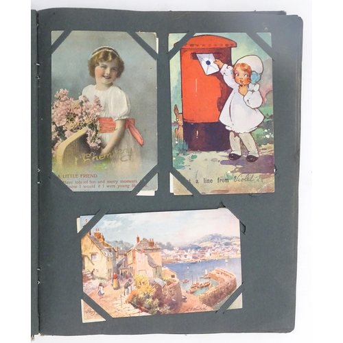 1970 - A Victorian scrapbook to include Christmas cards, greetings cards, scraps depicting cats, dogs, chil... 