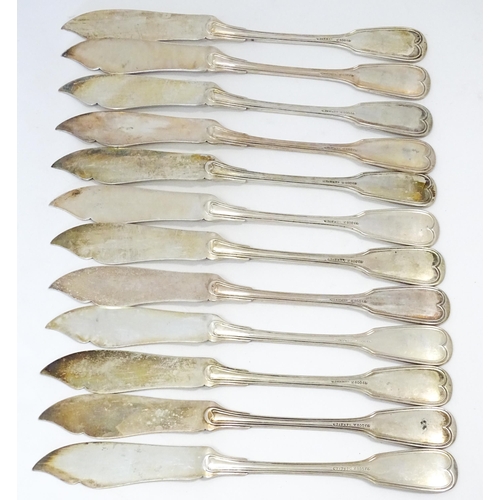 511 - A quantity of German .800 silver Fiddle & Thread pattern cutlery to include table forks, tablespoons... 