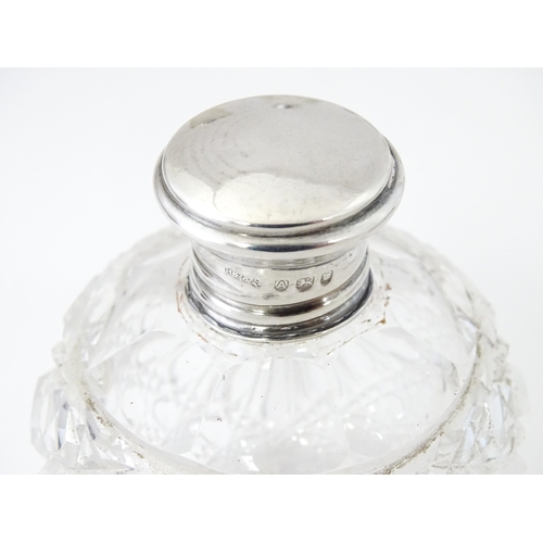 517 - A quantity of cut glass and silver and silver plate mounted items to include dressing table jars, sc... 